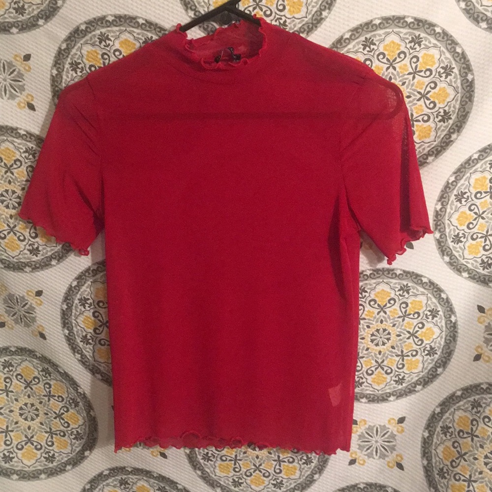 A red see-through blouse